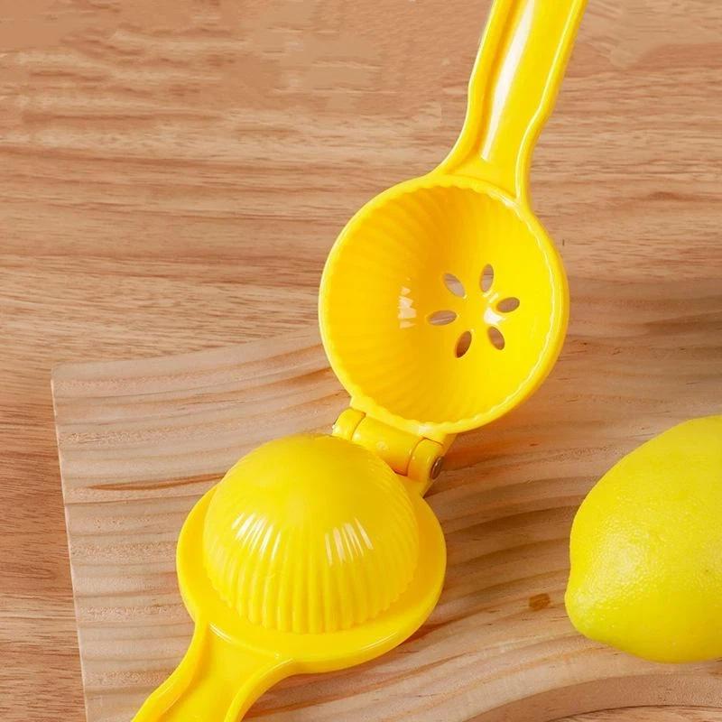 عصارة ليمون يدوية ملونة، أداة  - مراجعة Kitchen Gadgets Juicer وسعره